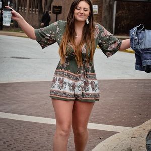 Large green print romper